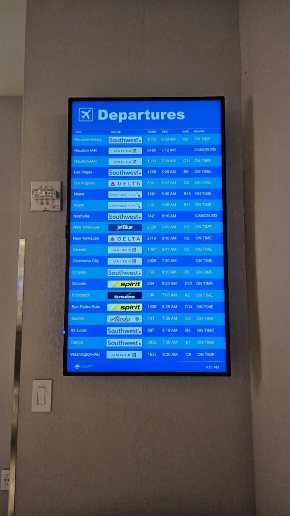 Review: The Club MSY Lounge- Louis Armstrong New Orleans International Airport 7 The Club MSY Flight Departure Info Screen