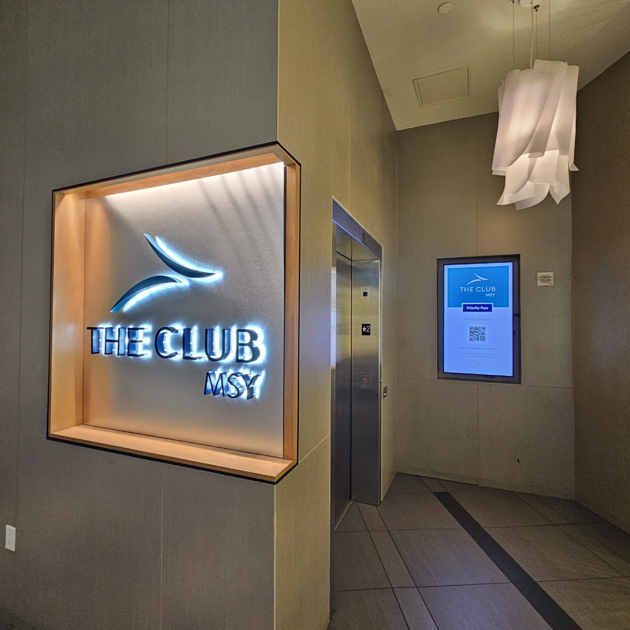The Club MSY Sign
