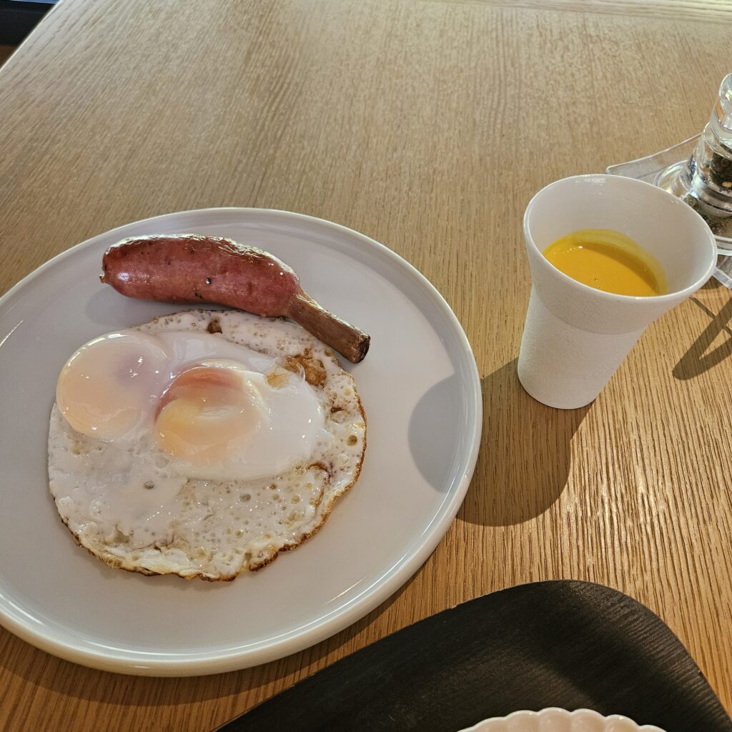 Roku Kyoto Breakfast at Tenjin Kyoto Duck Egg with Bone-in Sausage